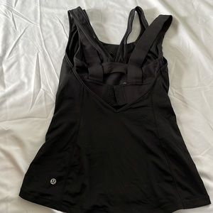 Brand new, super supportive tank with built in bra